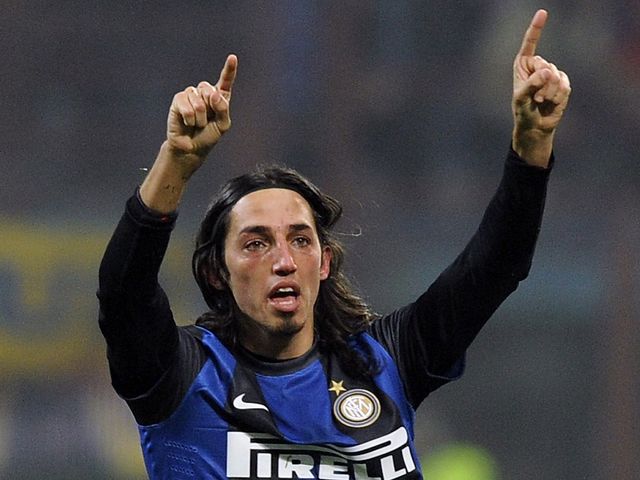 Ezequiel Schelotto celebrates his goal