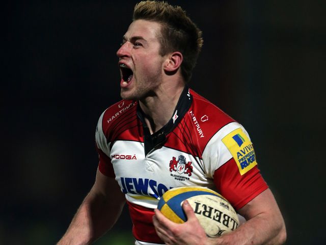 Henry Trinder celebrates his Gloucester try