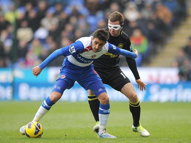 Jem Karacan and James McArthur battle for the ball
