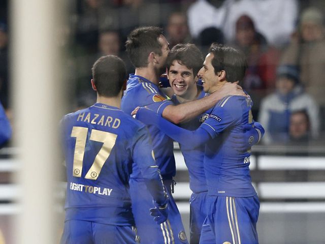 Oscar is mobbed after scoring