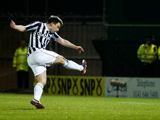 Paul McGowan scores from the penalty spot