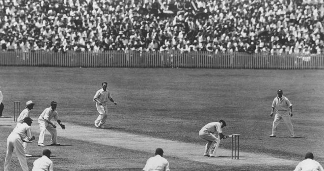 Harold Larwood: W M Woodfull ducks to avoid a rising ball from the England bowler during the fourth Test match at Brisbane on the infamous 'Bodyline' tour