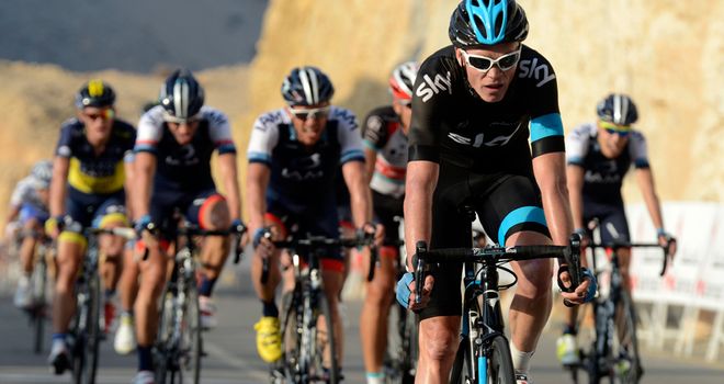 Chris Froome crosses the finish line at the Wadi Dayqah Dam