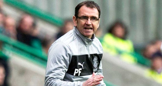 Pat Fenlon celebrates the penalty save from Ben Williams