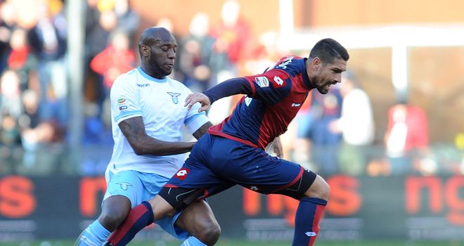 Marco Borriello moves away from Michael Ciani.