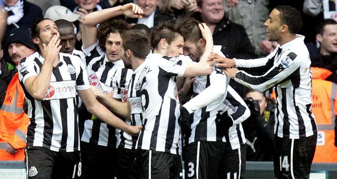 Newcastle players celebrate against Chelsea