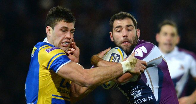 Joel Moon tangles with Melbourne's Cameron Smith