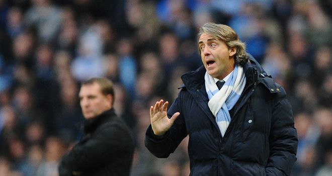 Roberto Mancini: Manchester City are nine points behind Manchester United with 13 games remaining