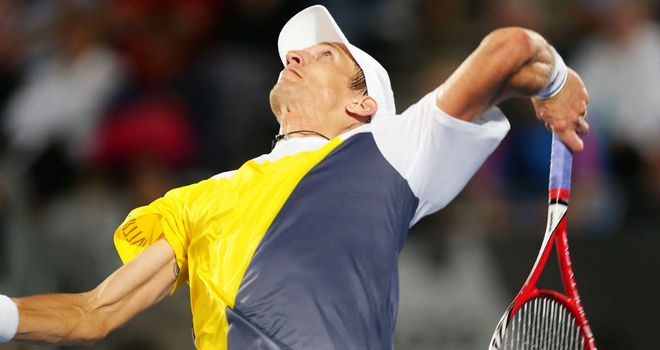 Jarkko Nieminen: held his nerve in a second-set tie-break to defeat his Russian opponent