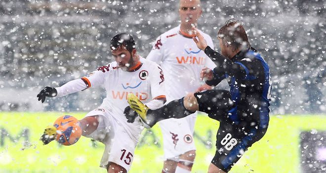 Miralem Pjanic beats Davide Biondini to the ball