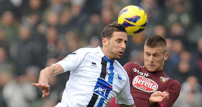 Riccardo Cazzola and Alen Stevanovic jump for the ball