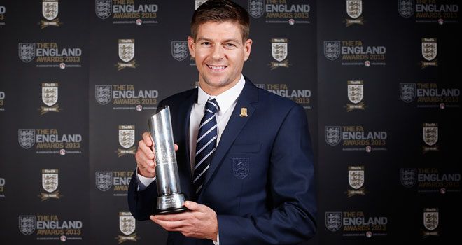 Steven Gerrard holds the trophy he first won in 2007