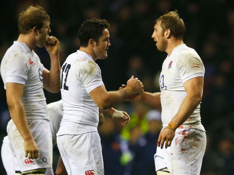 England captain Chris Robshaw (right) congratulates centre Brad Barritt...