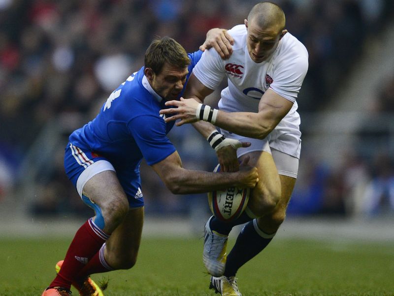 Vincent Clerc tustles with Mike Brown