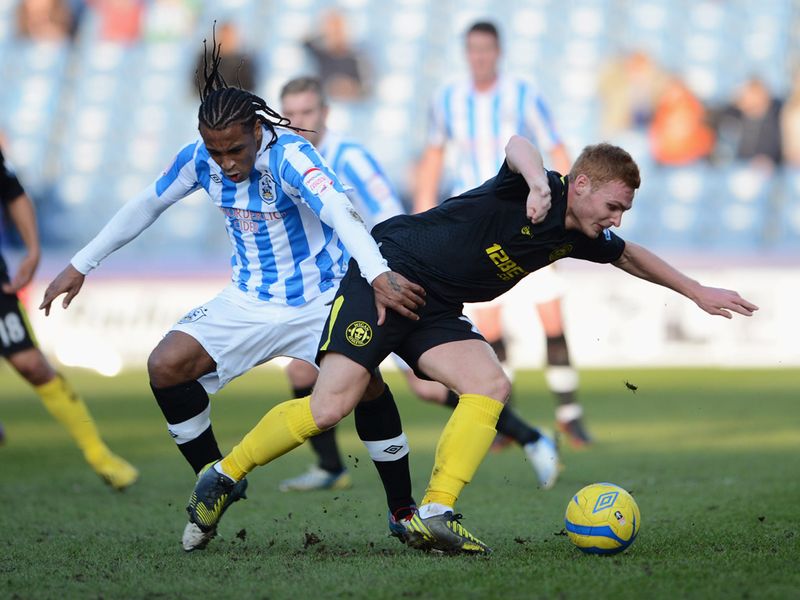 Huddersfield v Wigan ended the day's action in the FA Cup.