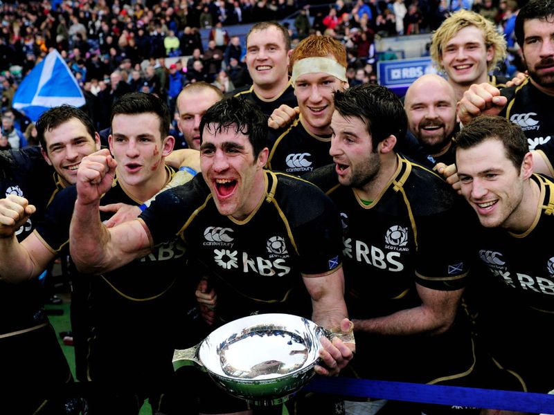 Scotland captain Kelly Brown and his team celebrate a sensational win against Ireland