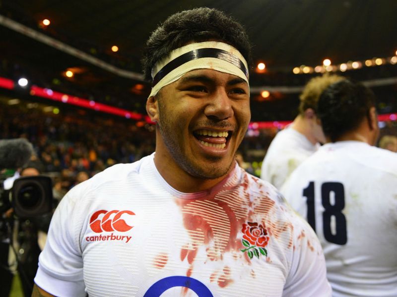 Manu Tuilagi sports the scars of battle... and a big grin