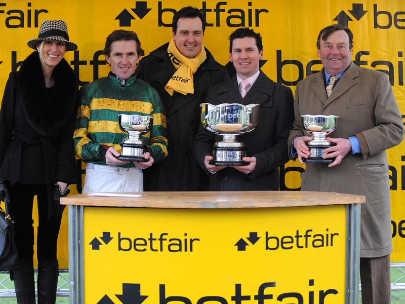My Tent or Yours' connections with their Betfair Hurdle trophies