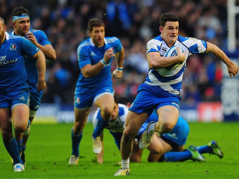 He's away: Matthew Scott bursts clear of the Italian defence
