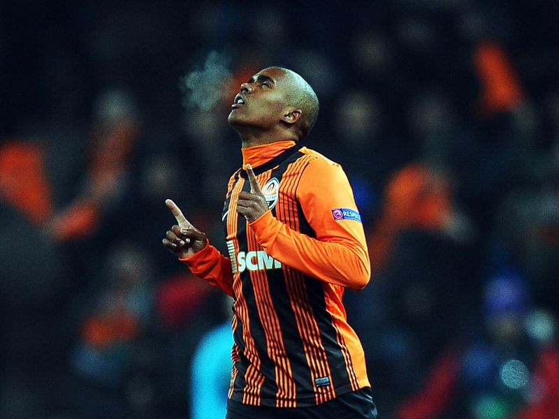 Douglas Costa celebrates after restoring Shakhtar Donetsk's lead against Borussia Dortmund