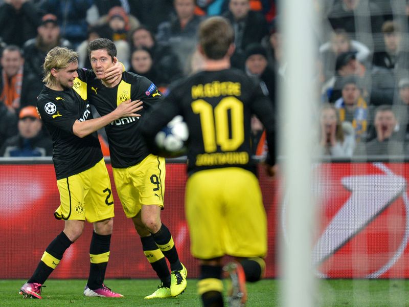 Robert Lewandowski is congratulated after drawing Borussia Dortmund level against Shakhtar Donetsk