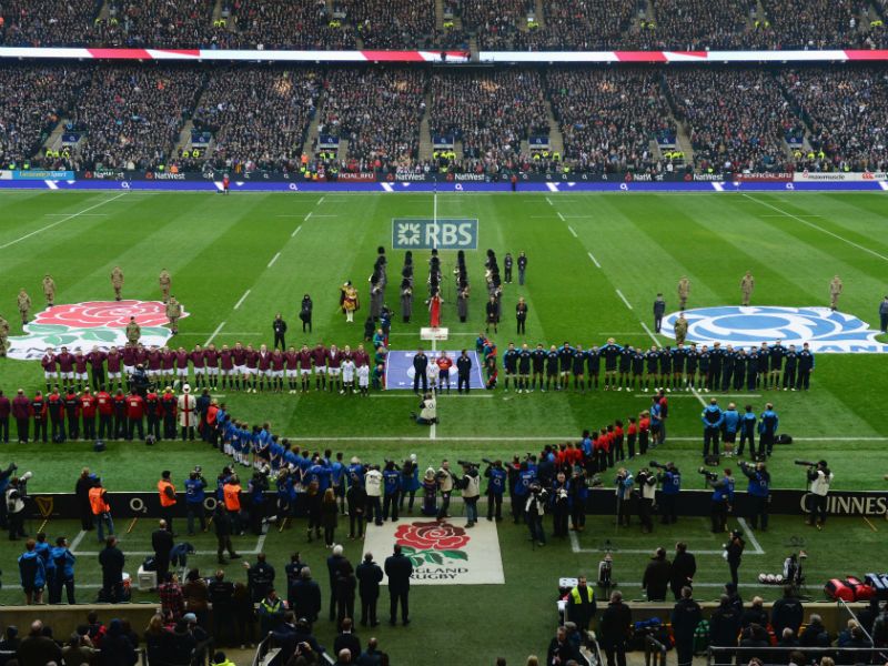 Getting ready: The teams line up at Twickenham