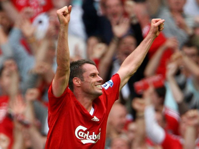Carragher celebrates after scoring a deflected shot in a win against Middlesbrough