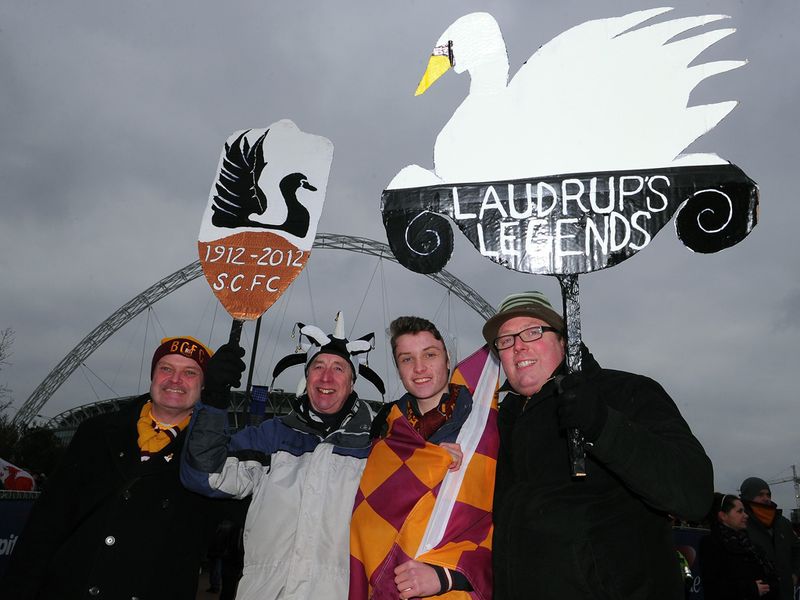 Bradford and Swansea fans soak up the atmosphere together on Wembley Way