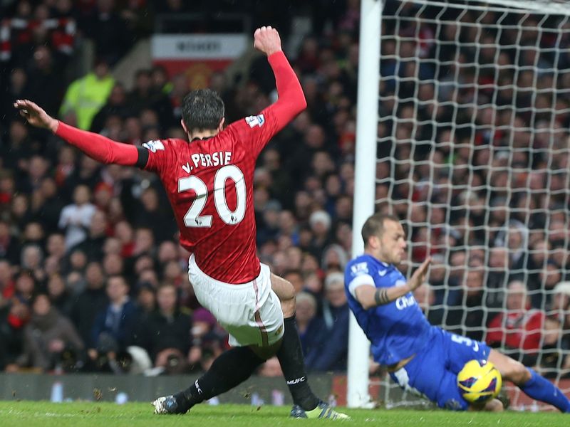 Toffees defender Johnny Heitinga is helpless to stop Van Persie slotting home after the striker rounds goalkeeper Tim Howard.