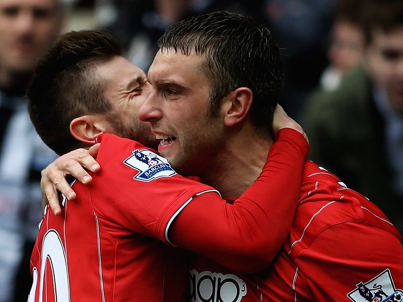 Rickie Lambert is congratulated by Adam Lallana after levelling the scores at 2-2 in the second half.