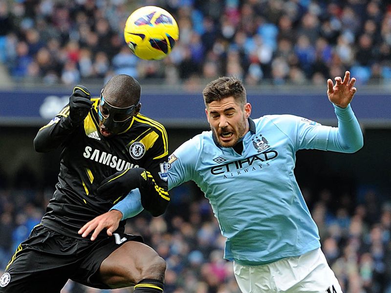 Ba and Javi Garcia vie for the ball as the two sides battle to take control.
