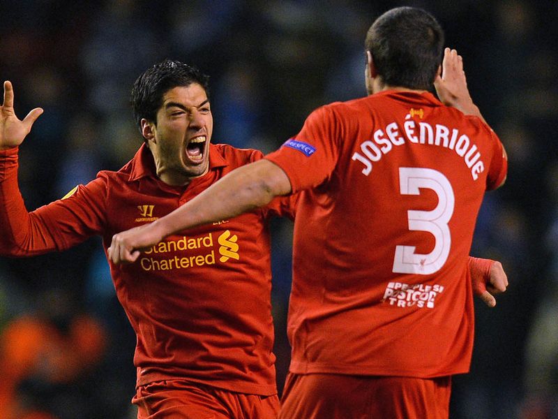 Luis Suarez scored two superb free-kicks for Liverpool but could not save them from exiting the competition to Zenit St Petersburg on away goals.