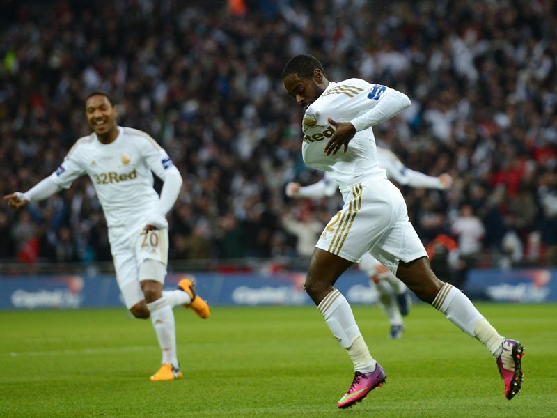 Nathan Dyer celebrates after firing the Swans to an early lead at Wembley