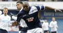 Shittu signs new Millwall deal