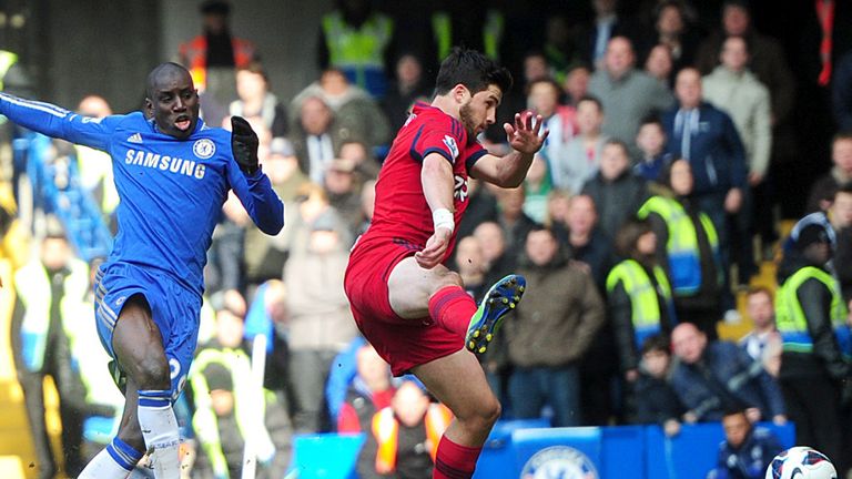 Demba Ba slots home the opening goal for Chelsea