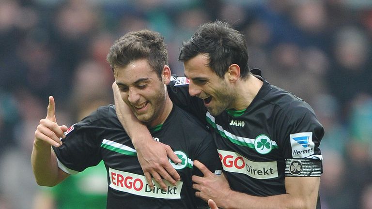 Thanos Petsos and Mergim Mavraj celebrate for the visitors