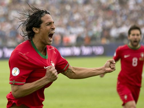 Bruno Alves celebrates scoring the opening goal