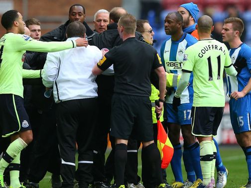 The half-time exchange at Wigan