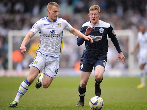 Tom Lees and Paul Dixon battle for the ball