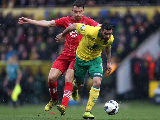 Jay Rodriguez tries to stop Bradley Johnson