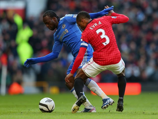 Victor Moses tangles with Patrice Evra.