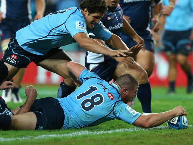 Paddy Ryan goes in for a Waratahs try