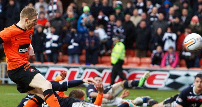 Michael Gardyne nets his goal in the Dundee derby