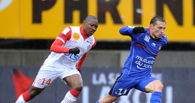 Paul Alo'o Efoulou and Eric Bautheac battle for the ball