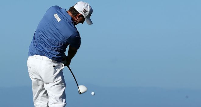 Padraig Harrington - pictured here at Pebble Beach - is two off the pace in Thailand