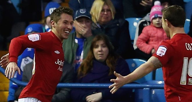 Radoslaw Majewski celebrates winner