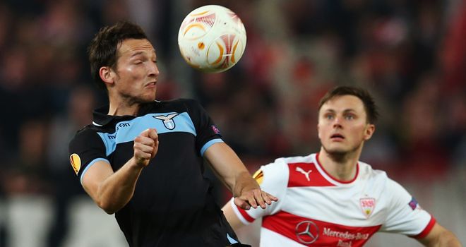 Libor Kozak and William Kvist battle for the ball