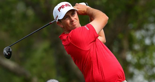 Michael Thompson: birdied the last to join Luke Guthrie on eight under par at the top of the leaderboard
