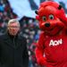 ... while Sir Alex Ferguson gets a pep talk from Fred the Red