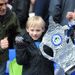 This Wigan fan is all smiles as a 3-0 win takes the Latics into the semi-finals